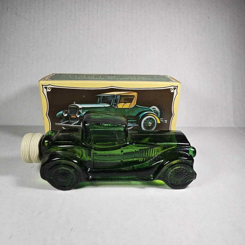 Avon Sterling Six II Green Glass Car Bottle